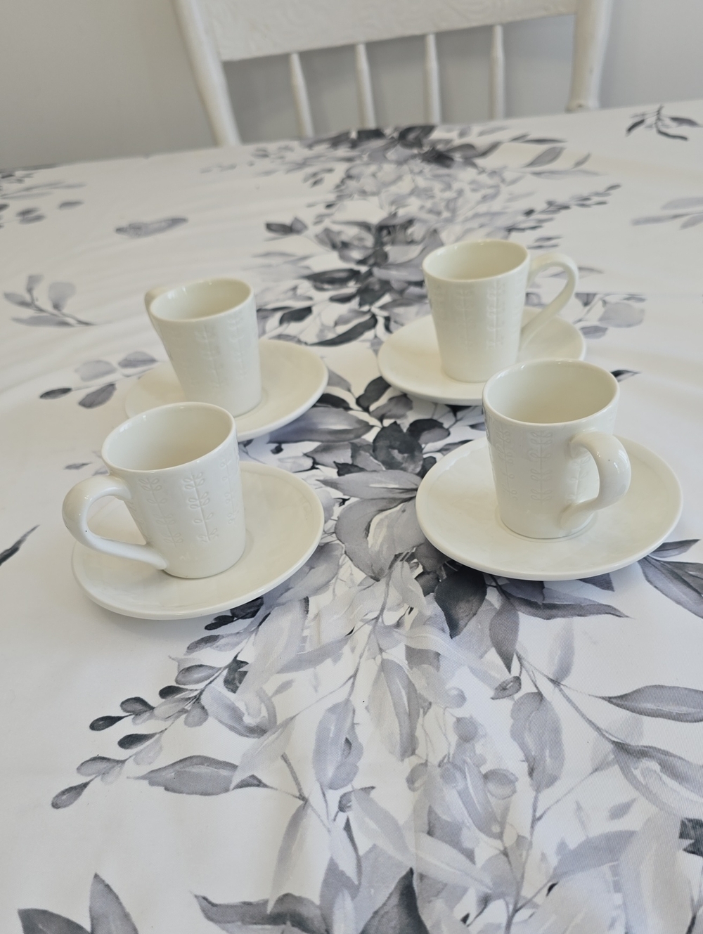 Natural Elements Set Of 4 Espresso Cups Saucers White Ceramic Embossed